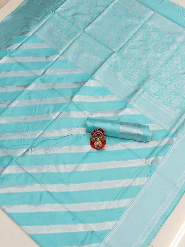 Zupppy Apparel Light Blue Color Soft Lichi Silk Saree with beautiful Rich Pallu and Heavy Jacquard Border Design.