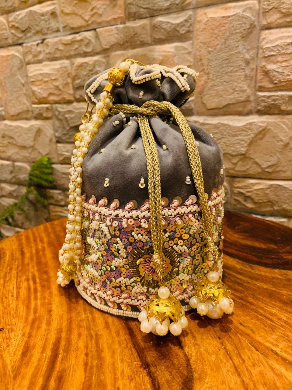 Beautiful Potli Bag Designs to Carry at Wedding Ceremonies | WeddingBazaar  | Embroidery bags, Handcrafted bags, Beaded bags