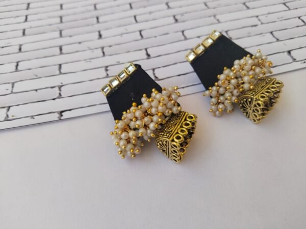 Zupppy Jewellery Rainvas Black and golden beaded jhumka earrings