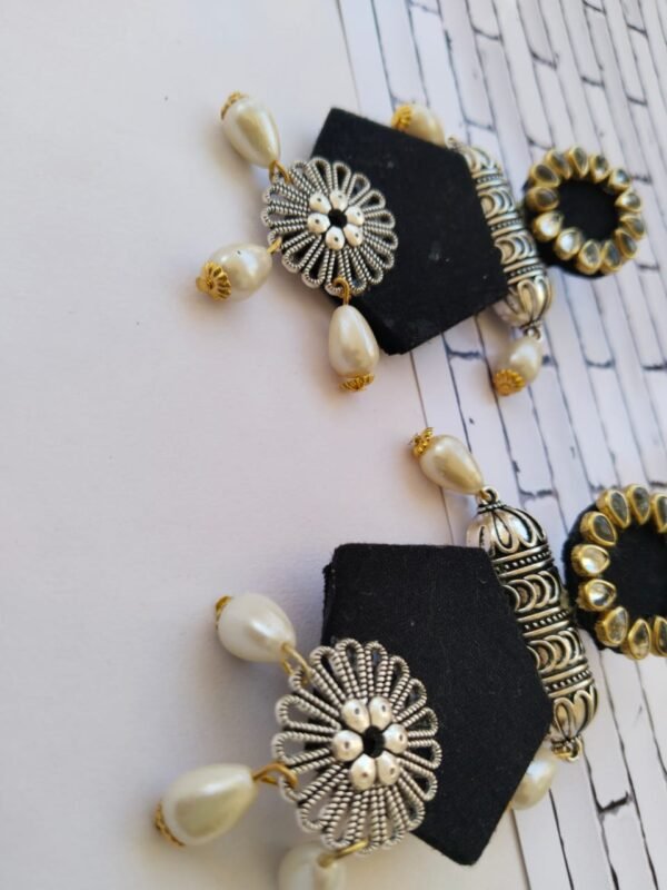 Zupppy Jewellery Rainvas Black long jhumka earrings with pearls for women